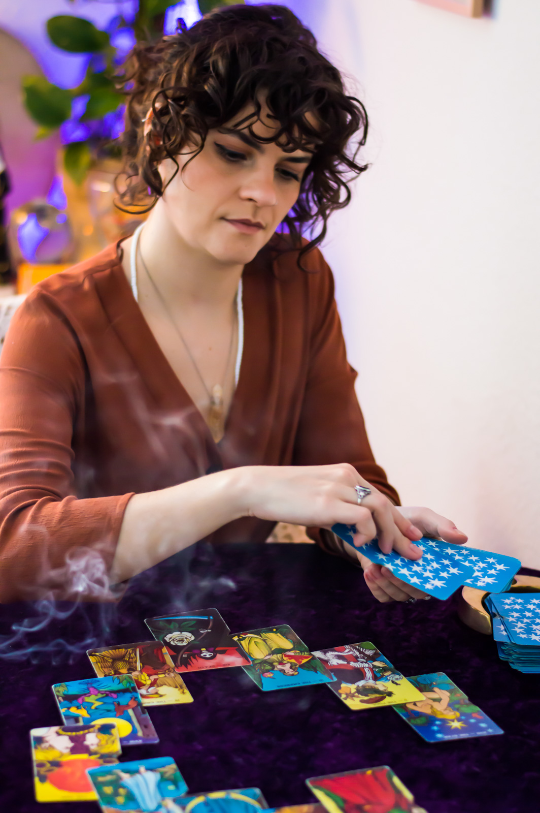 Paulina reading Tarot